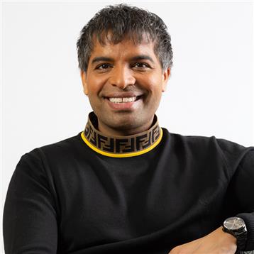 Headshot of Suki Sandhu OBE